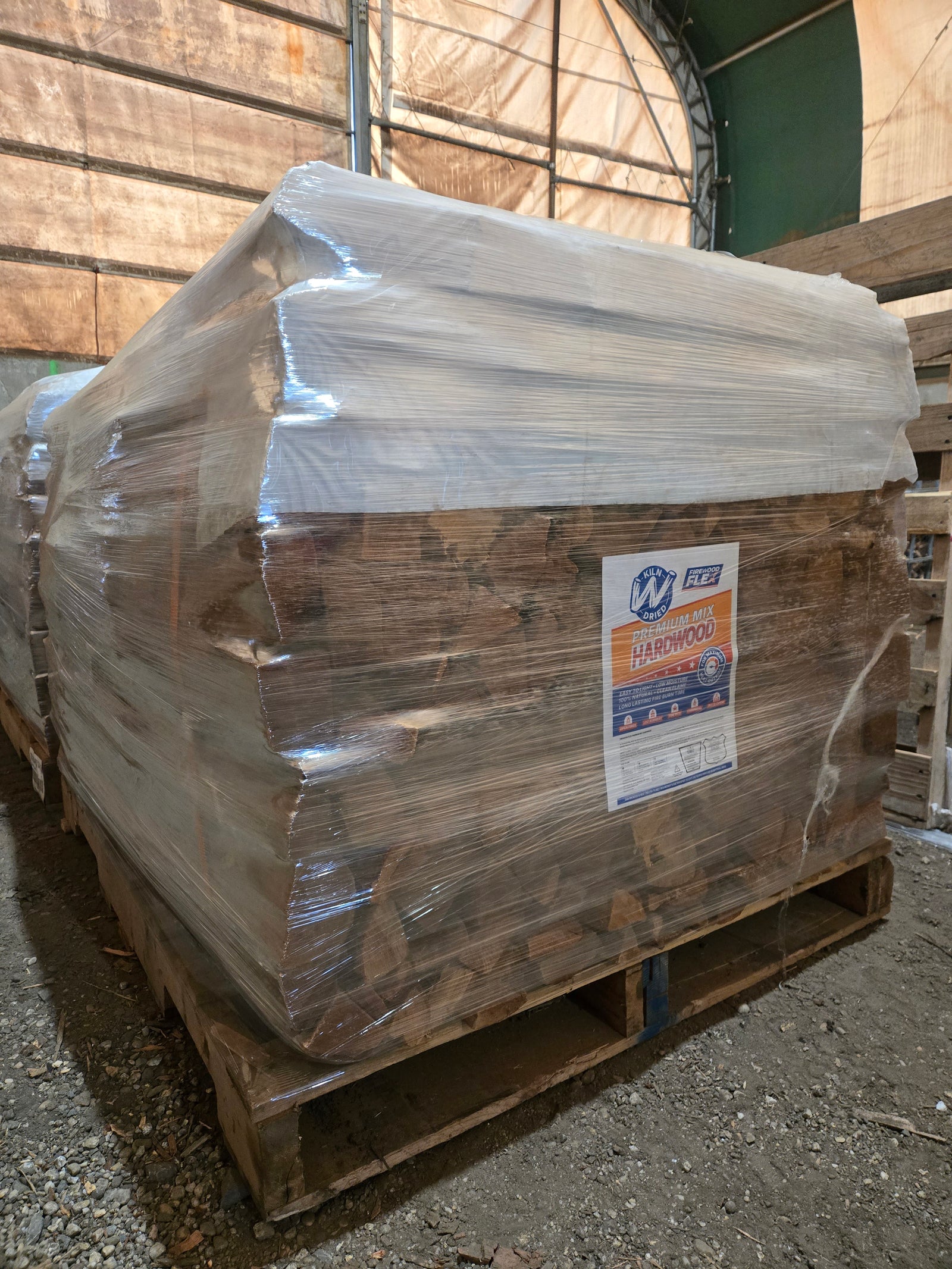 Quarter cord kiln-dried firewood neatly palletized
